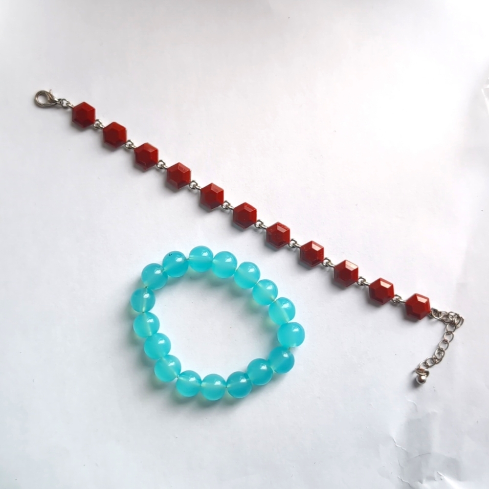Topshop set of two beaded blue bracelet and geometric burgundy bracelets